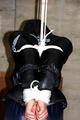 Julia tied and gagged in down jacket (cellar)