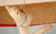 Tapegagged toples barefoot Doris, bound on the floor, suspended by one foot