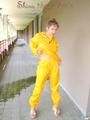 Leonie wearing a super sexy yellow rainwear combination posing outdoor (Pics)