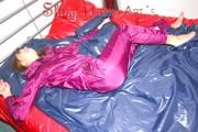 Alina preparing her bed for relaxing and lolling on the bed wearing a sexy shiny nylon rain pants and a rain jacket (Pics)