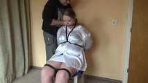 Sandra chairtied and drooling 2/2