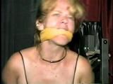 38 Yr OLD CASHIER IN BLACK LEATHER DRESS, TIED & GAGGED HOSTAGE (D22-14)