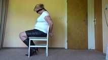 Cuffed on a chair 002