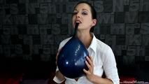 Blowing up a belbal and bite to pop them