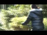 Enni riding the bicycle wearing a sexy shiny nylon shorts beneath the jeans and a downjacket on naked skin (Video)