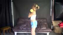 Watching sexy Sandra wearing a sexy lightblue shiny nylon shorts and a white top during her workout with barbells (Video)