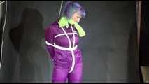 MARA tied and gagged overhead with ropes and a cloth gag wearing a super sexy super shiny purple rainsuit and blue rubber boots (Video)