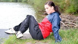 Enni outdoor wearing shiny nylon shorts rain pants and rain jacket (Pics)