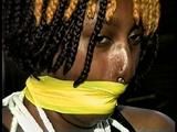 21 Yr OLD BLACK COLLEGE STUDENT GETS MOUTH STUFFED, WRAP TAPE GAGGED WHILE TIED TO A CHAIR  WEARING BLACK LINGERIE, GARTER BELT & HIGH HEELS (D65-4)