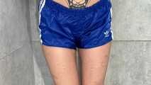 Myxxxy wetting her shiny nylon Shorts