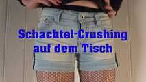 Box crushing on the table