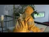 Get 2 Videos with Katharina in her shiny nylon Rainwear from our Archives