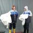 Lady Nadja and Miss Francine in some nylon rainwear part 3