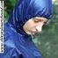 Stella bound outdoor in a blue rainsuit