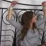 Cindy roped on bed 2/2