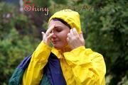 Jill Diamond in the garden playing with water out of the garden hose wearing supersexy shiny nylon rainwear and a rain cape (Pics)