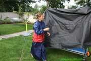 Watch Sandra in the Garden wearing a Rainskirt and Rainjacket