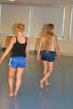 Katharina and Jenny during their workout in the fitness center wearing sexy shiny nylon shorts and tops (Pics)