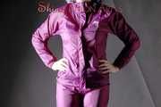 Mara posing infront of the camera for you wearing supersexy purple rainwear and rain boots (Pics)