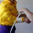 Julia tied and gagged in a ski suit in the bath tub