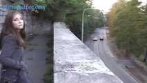 078049 Rachel Evans Takes A Daredevil Pee Down On To The Street Below