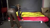 Sexy Sandra preparing her bed wearing sexy shiny nylon downwear (Video)