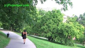 050013 Roxy Sits On A Swing In The Park And Then Pees On The Path