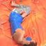 [From archive] Alice Lee - mummified in blue and silver duct tape (video)