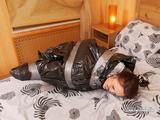 [From archive] Dominica Phoenix - ball taped and packed in trash bag