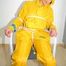 Katharina tied, gagged and hooded on a chair wearing sexy yellow rainwear (Pics)