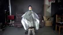 See Ronja tied and gagged on a Barber Chair in shiny nylon Rainwear and a shiny cape!