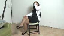Jasmin roped to chair 1/2