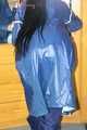 Lucy wearing sexy blue shiny nylon rainwear cleaning the mirror (Pics)