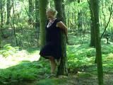 Cuffed to a tree