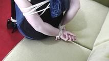 Maria tied up on the sofa 2/2
