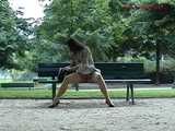 016080 Eve Takes A Pee From A Bench Beneath The Eiffel Tower