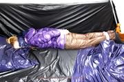 Samantha tied and gagged in shiny nylon downwear