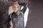 Mara wishing you a merry christmas wearing a sexy black rainwear combination and wings...(Pics)