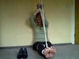 Tied bare feet