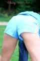 Enni wearing sexy blue shiny nylon shorts and rainjacket during her warm-up (Pics)