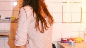 Watching Alina trying on different shiny nylon shorts and a rain jackets (Pics)