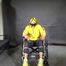 Watch Marie bound to a Wheelchair and tightly gagged in shiny nylon Rainwear