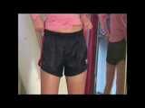 Get 2 Videos with July enjoying her Shiny Nylon Shorts from our 2010 Archive