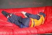 *** HOT HOT HOT*** NEW MODELL*** DESTINY wearing a sexy blue/red shiny nylon rain suit and a life jacket ties and gagges herself with cuffs on a sofa (Pics)