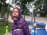 Watch Sandra bound and gagged in her shiny nylon Downjacket nylon hooded.