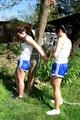 Jill tied and gagged by her friend in shiny nylon shorts