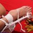 Tied up to the bed