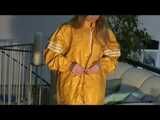 Get 2 Videos with Katharina in her shiny nylon Rainwear from our Archives