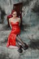 Bound in red PVC dress