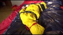 Sonja tied, gagged and hooded on bed with tape wearing a supersexy yellow rainwear combination (Video)